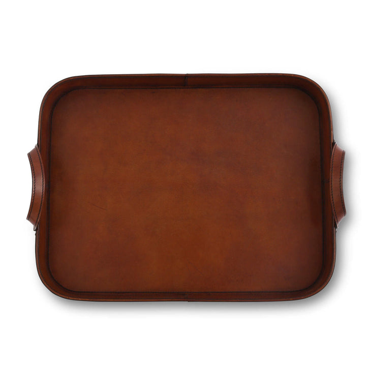 Brown leather tray with handles on a white background