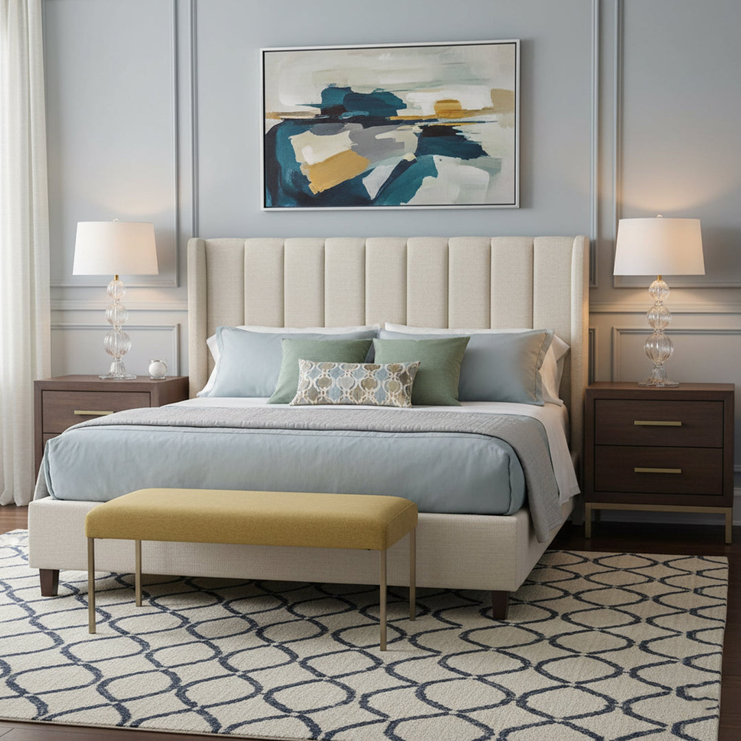 Bedroom with a bed, nightstands, and abstract art on the wall. Two Murano glass table lamps on nightands.