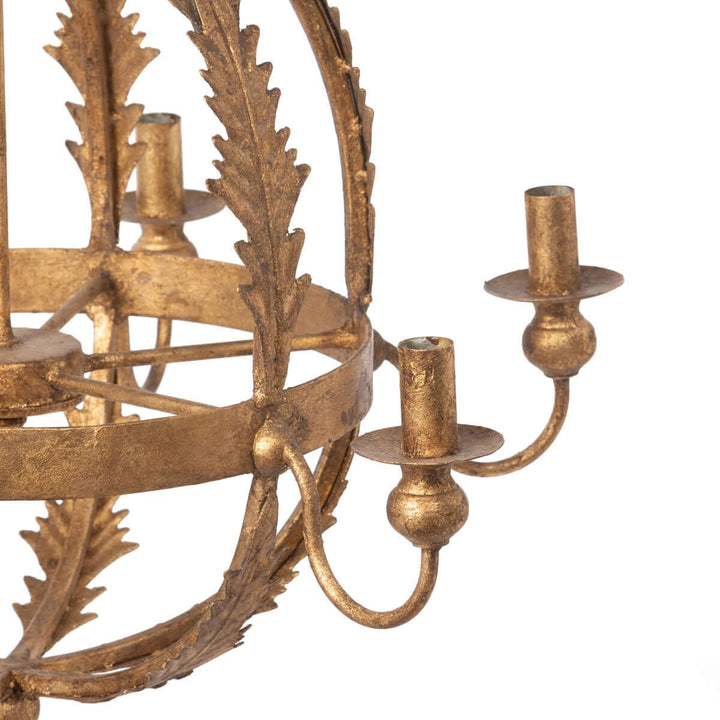 Decorative gold chandelier with intricate design on a white background