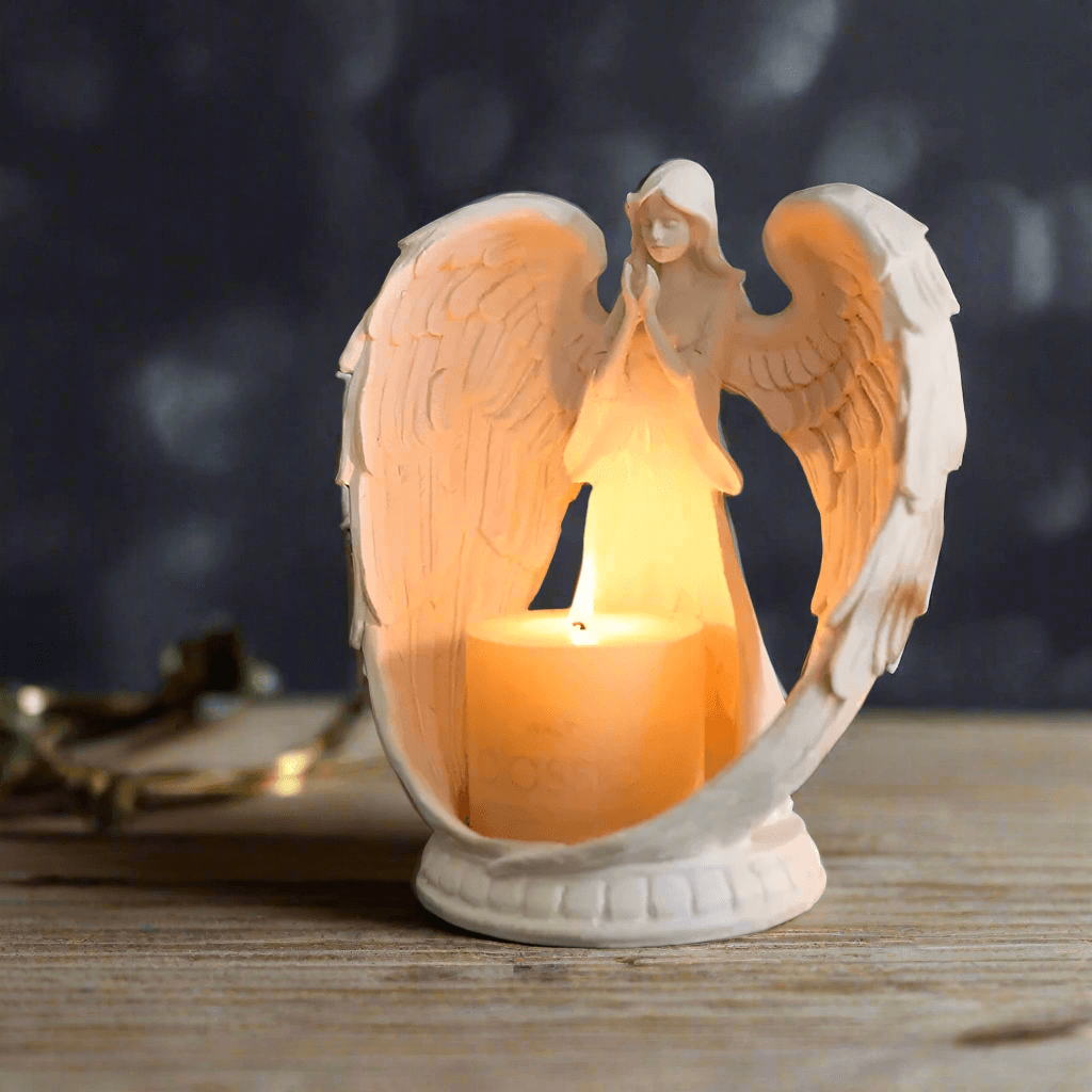 Guardian Angel Candle Holder with prayerful angel and lit candle, evoking warmth and vintage charm.