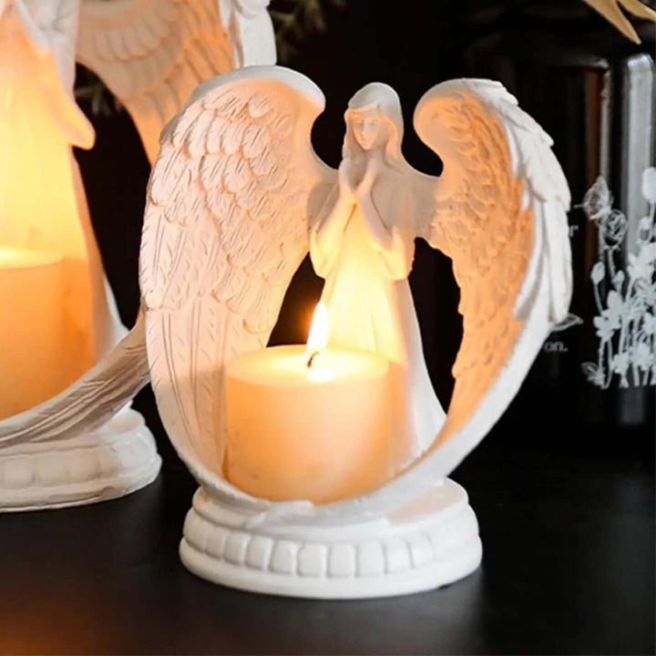 Guardian Angel Candle Holder featuring a delicate angel design with a lit candle, adding warmth and vintage charm.