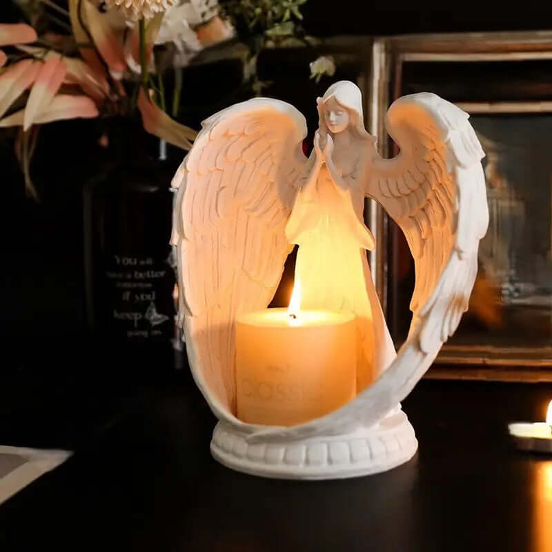 Guardian Angel Candle Holder with an angel figurine and lit candle, adding warmth and vintage charm to any decor.