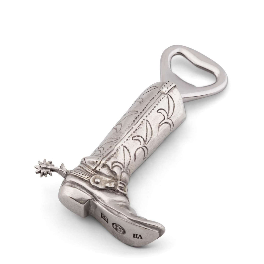 Decorative silver cowboy boot bottle opener on a white background