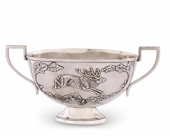 Silver bowl with a deer design on a white background