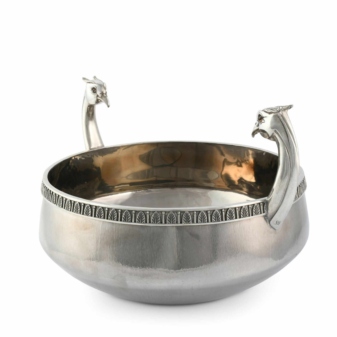 Silver bowl with pheasant handles on a white background