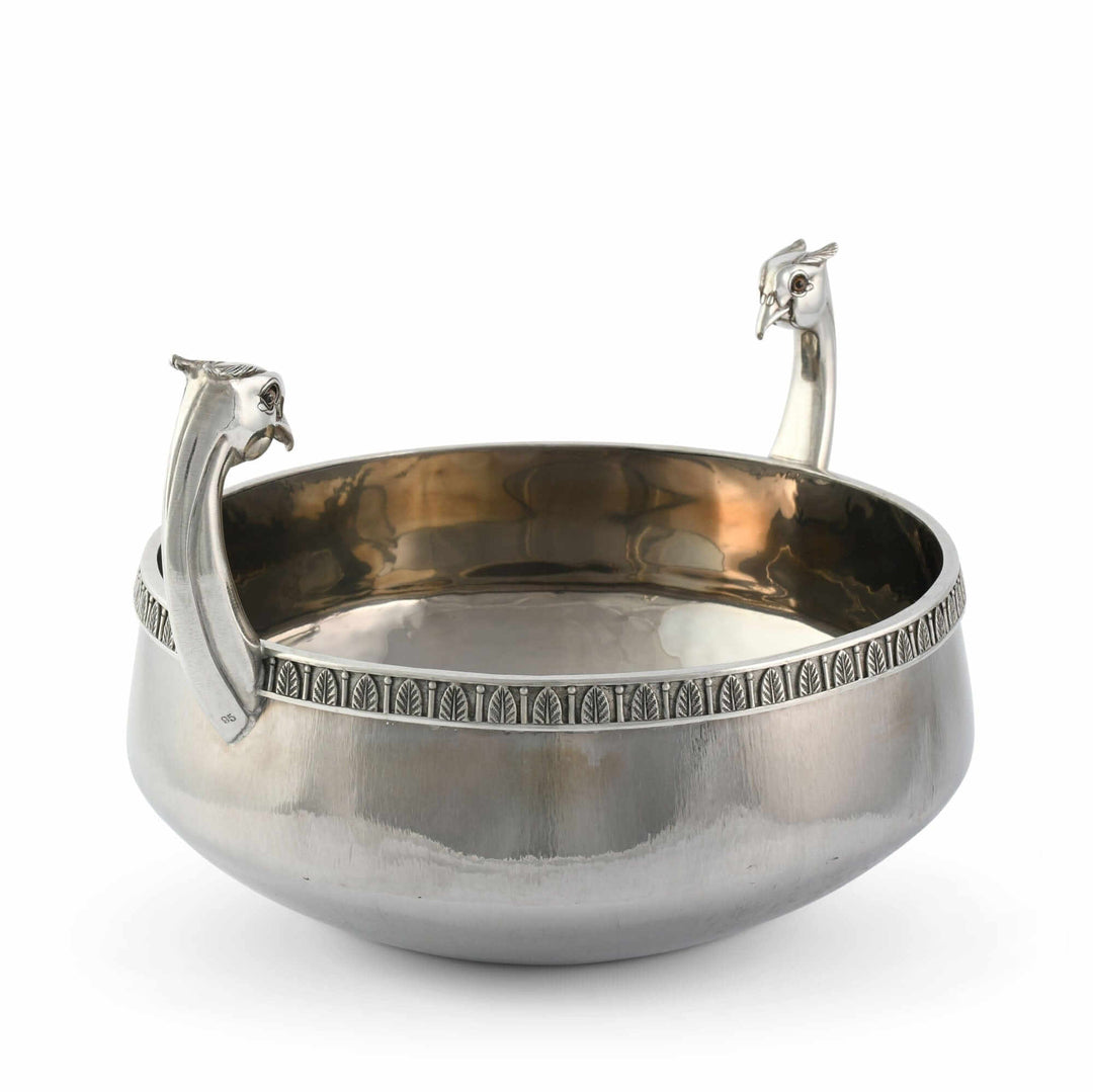 Silver bowl with pheasant handles on a white background
