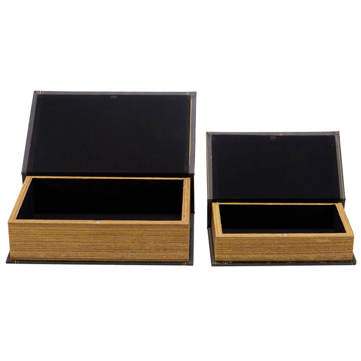 Two wooden boxes with black interior lids on a white background