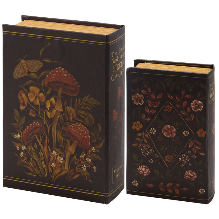 Decorative books with floral and mushroom designs on a white background