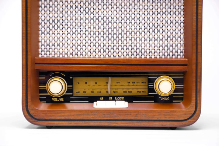 Vintage-style radio with wooden casing on a white background