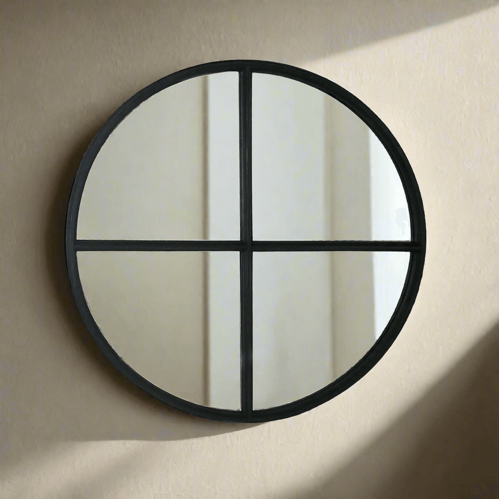 Large round black wooden wall mirror with crossbar design, perfect for modern and industrial interior decor.
