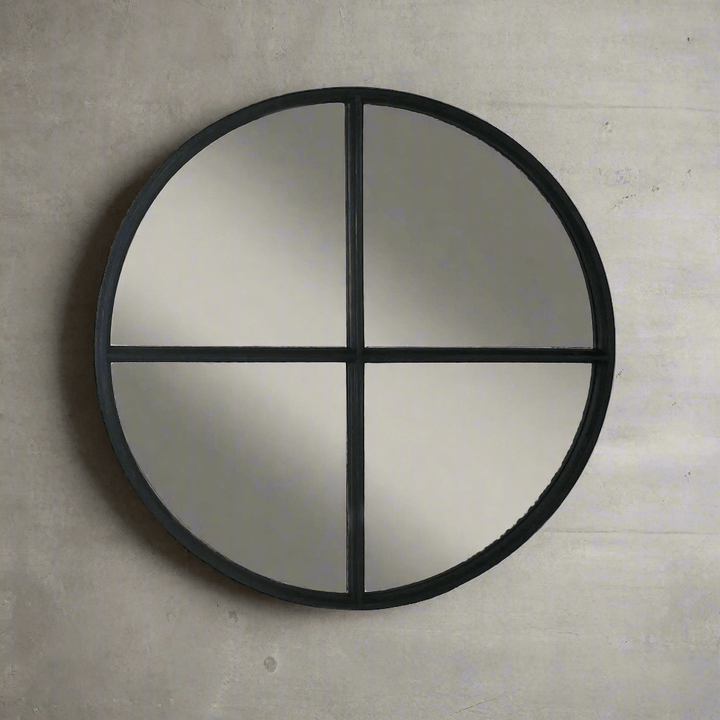 Large round black wood wall mirror with crossbar design, ideal for modern and industrial interiors.