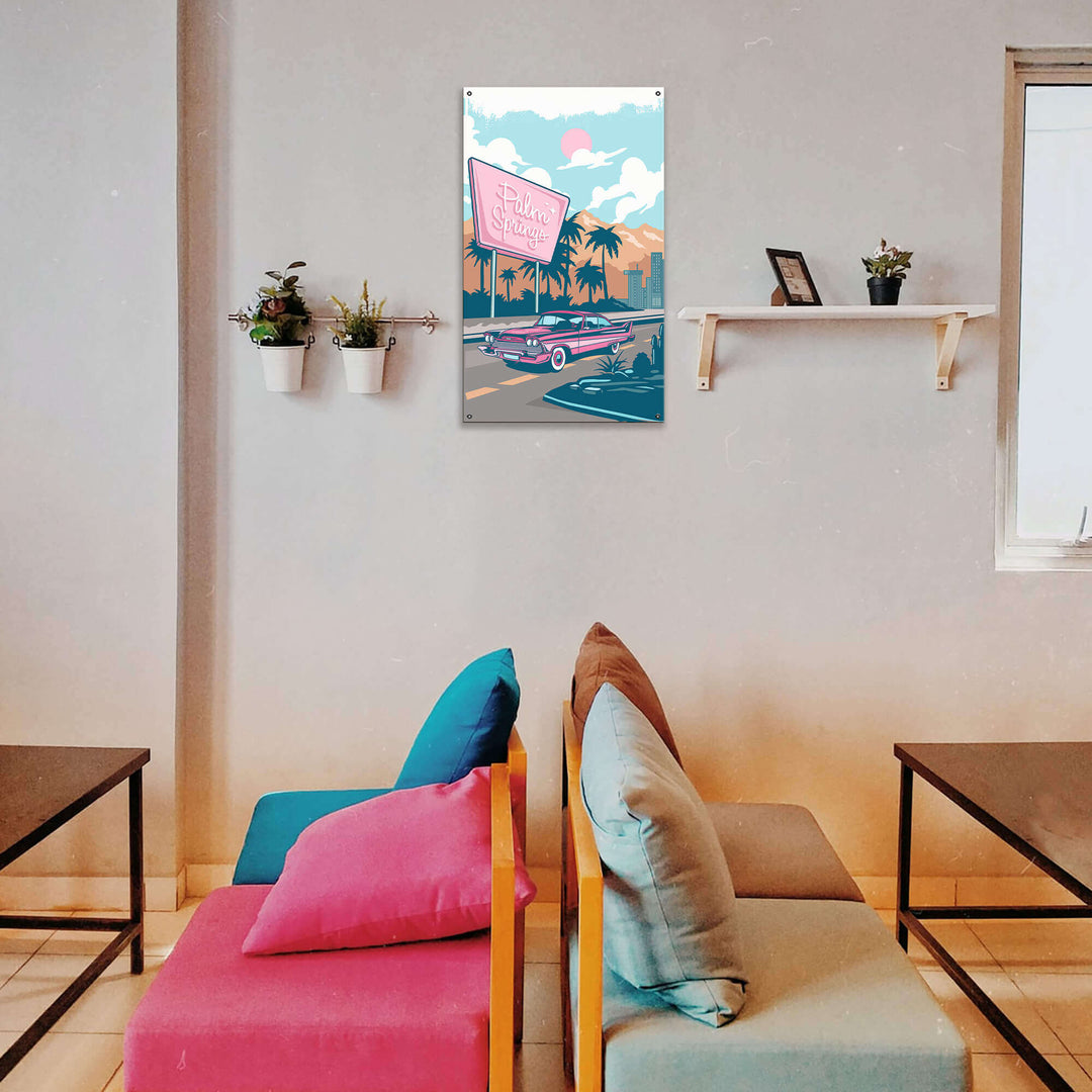 Modern living room with colorful cushions on a sofa and a decorative wall art piece.
