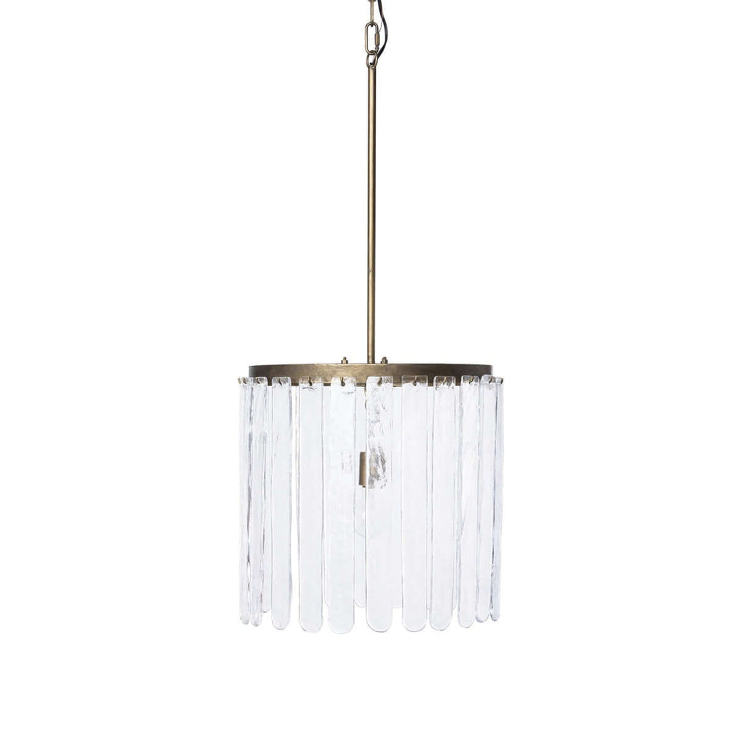 Chandelier with clear glass elements and brass finish on a white background