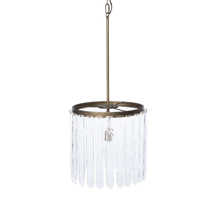 Pendant light with clear glass shade and brass fixture on a white background