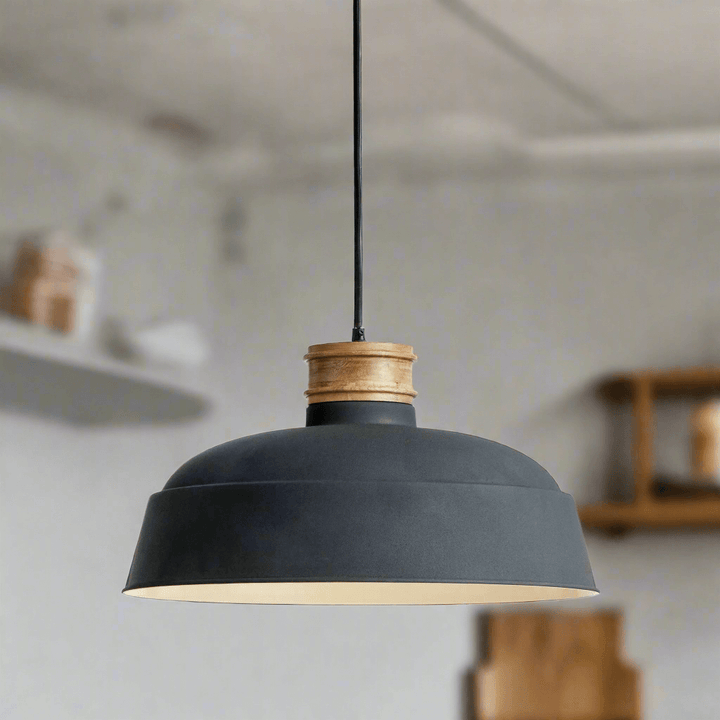Industrial wood and metal pendant light in matte charcoal with turned wood neck, perfect for modern rustic decor.