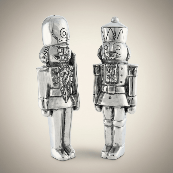 Nutcracker Salt and Pepper Set in Handcrafted Pewter on beige background