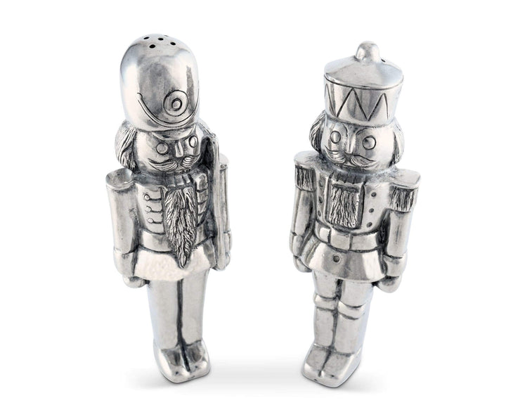 Silver nutcracker salt and pepper shakers on a white background