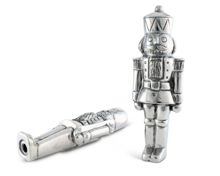 Silver nutcracker salt and pepper shakers on a white background