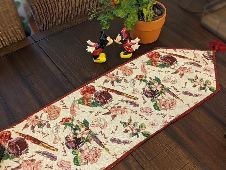 DaDa Bedding Sweet Heart Love Notes Pink Floral Woven Tapestry Dining Table Runner (18273) on wooden table with decorative items
