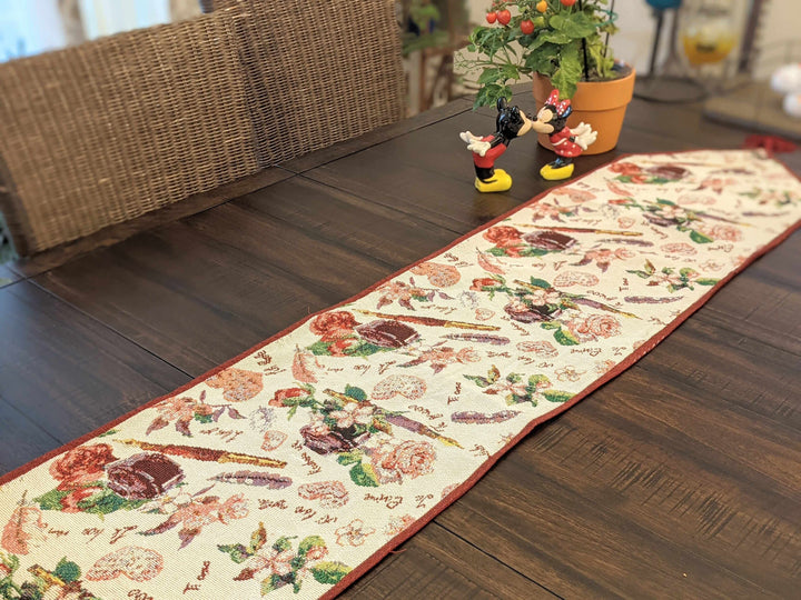DaDa Bedding Sweet Heart Love Notes Pink Floral Woven Tapestry Dining Table Runner (18273) on a wooden table
