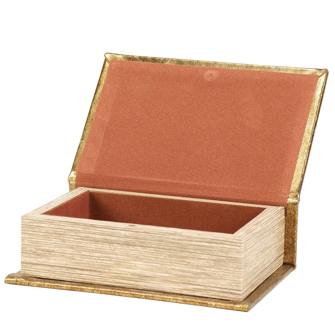 Wooden box with a gold rim and red interior on a white background