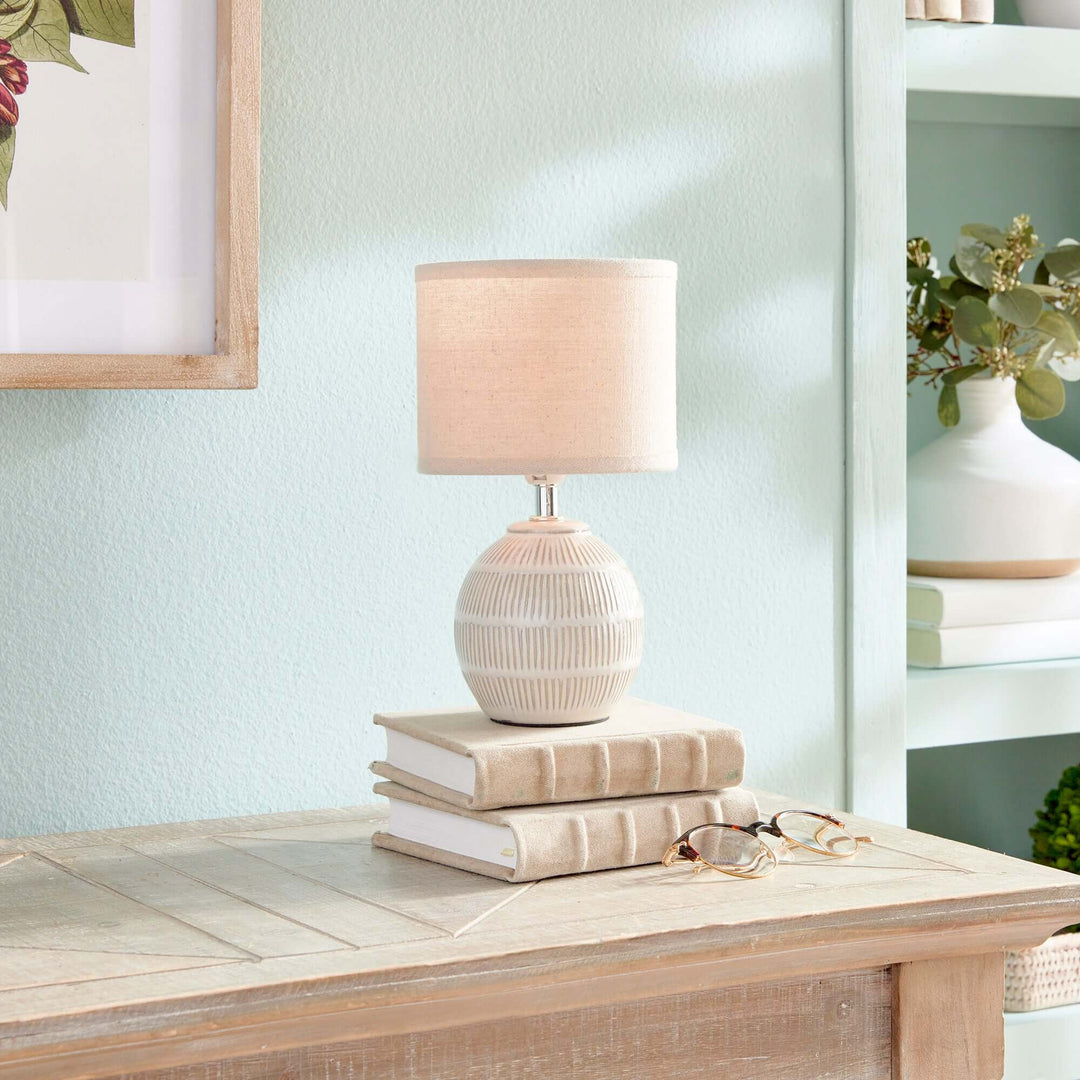 Petite Vintage Ceramic Lamp for Small Tables on pile of books on table