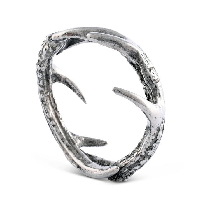 Silver antler napkin ring on a white background