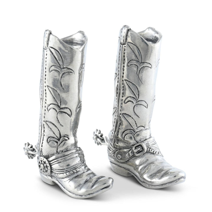 Silver cowboy boot salt and pepper shakes on a white background