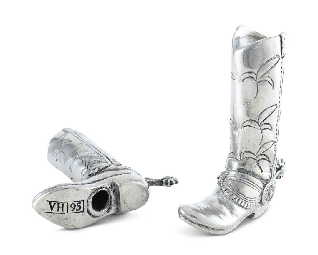 Silver cowboy boot salt and pepper shakers with 'VH 95' engraving on a white background