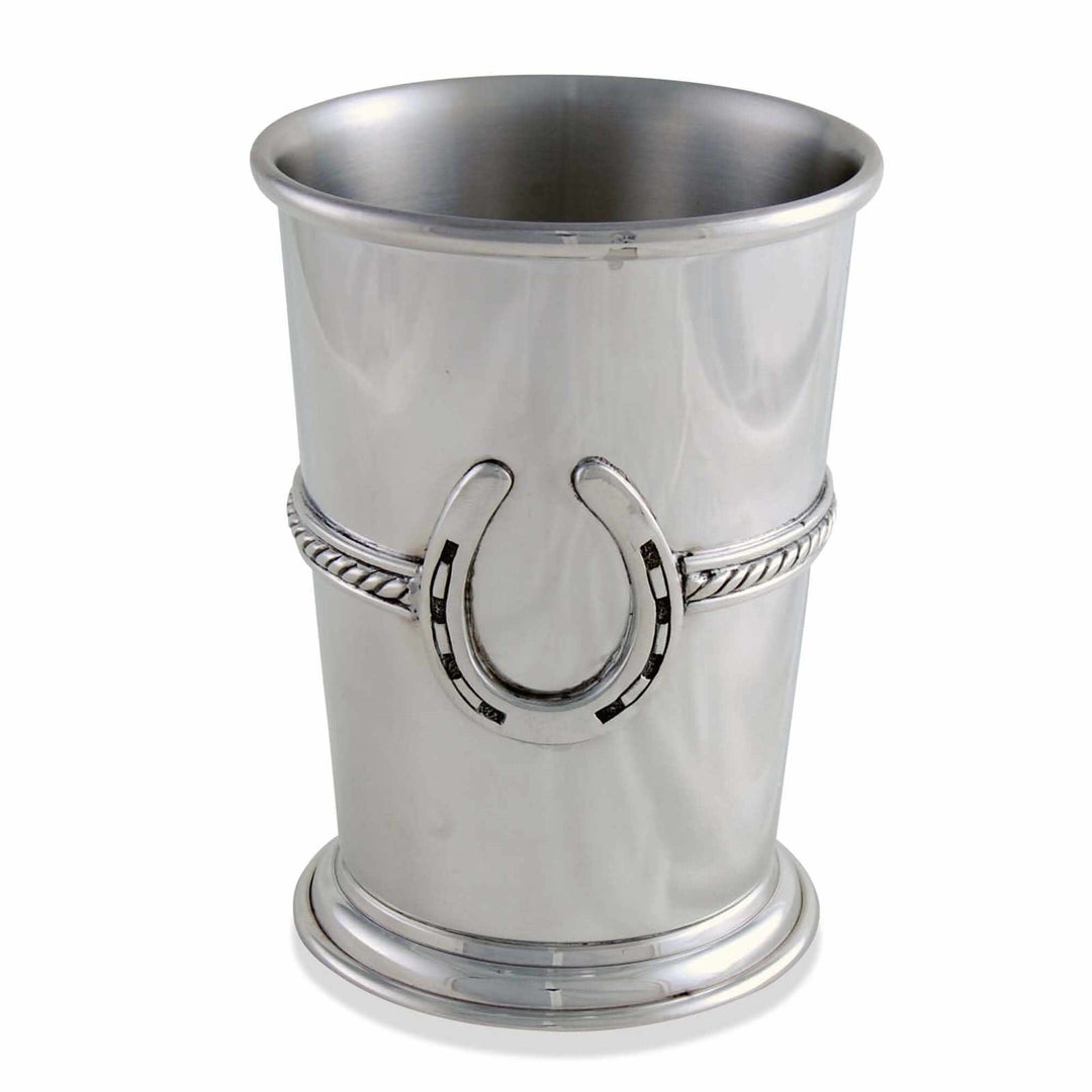 Silver mint julep cup with a horseshoe design on a white background