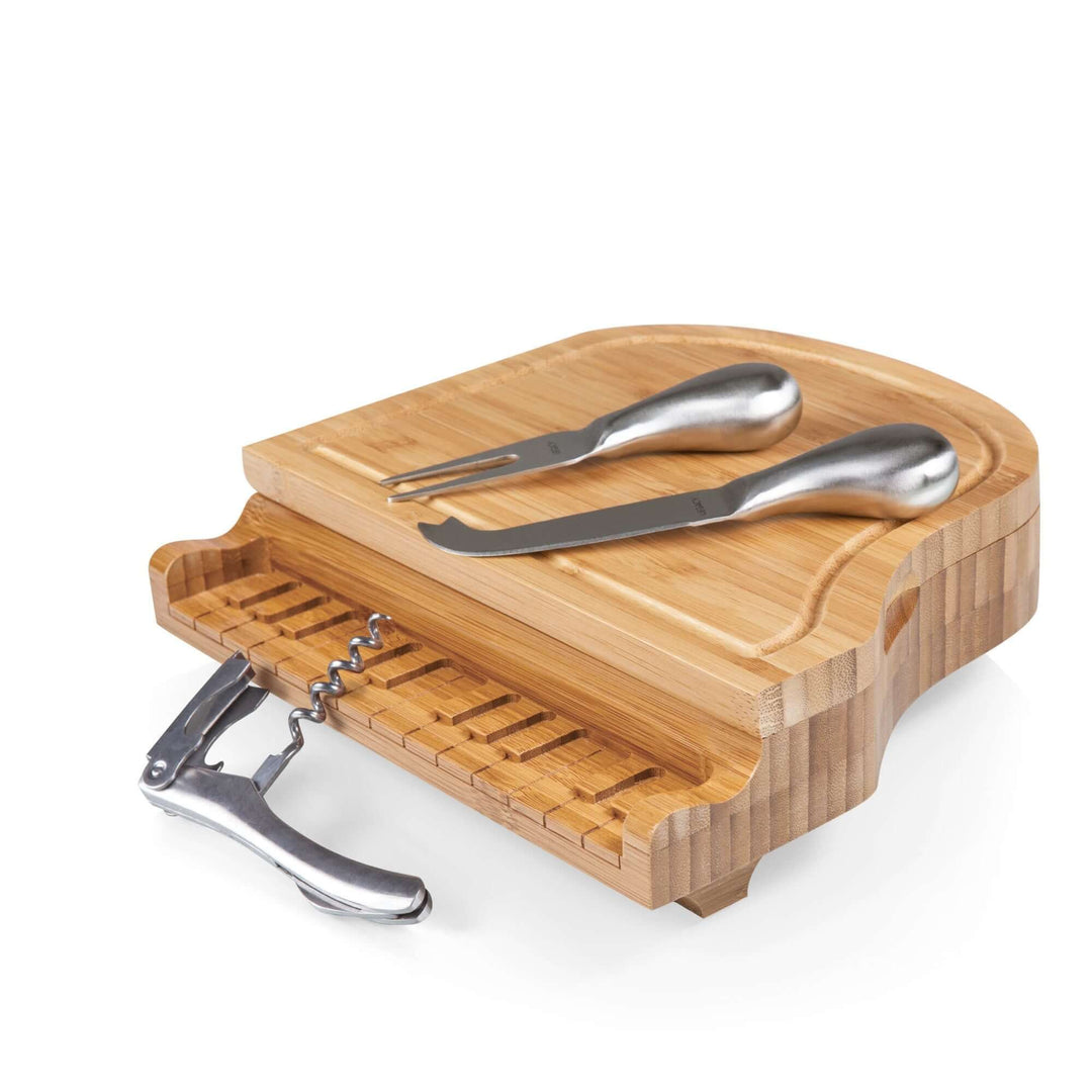 Piano Cheese Board and Knife Set shaped like a grand piano, made from bamboo with stainless steel utensils, featuring a hidden corkscrew.