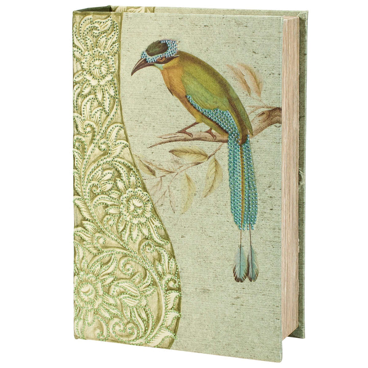 Book with a decorative cover featuring a bird illustration and floral patterns.