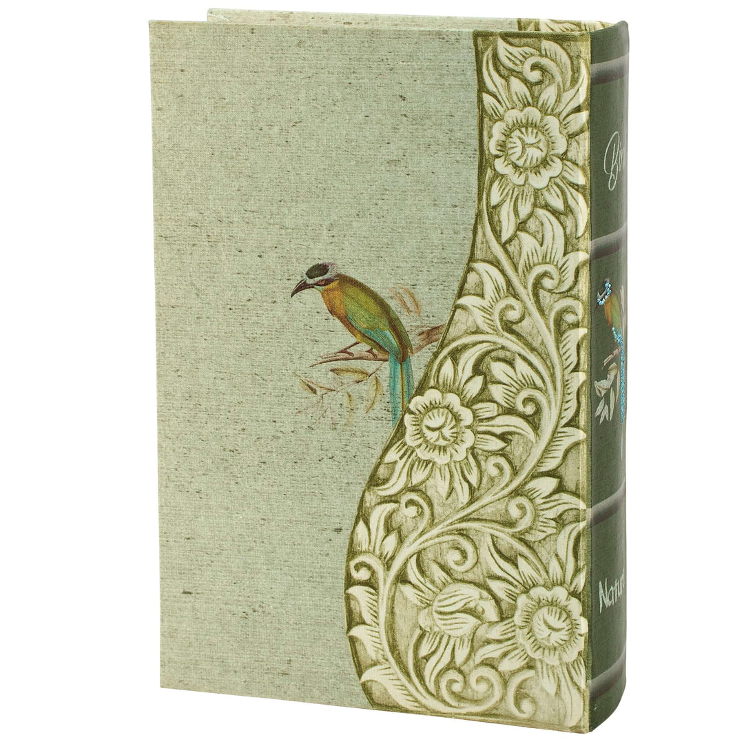 Book with floral design and bird illustration on a white background