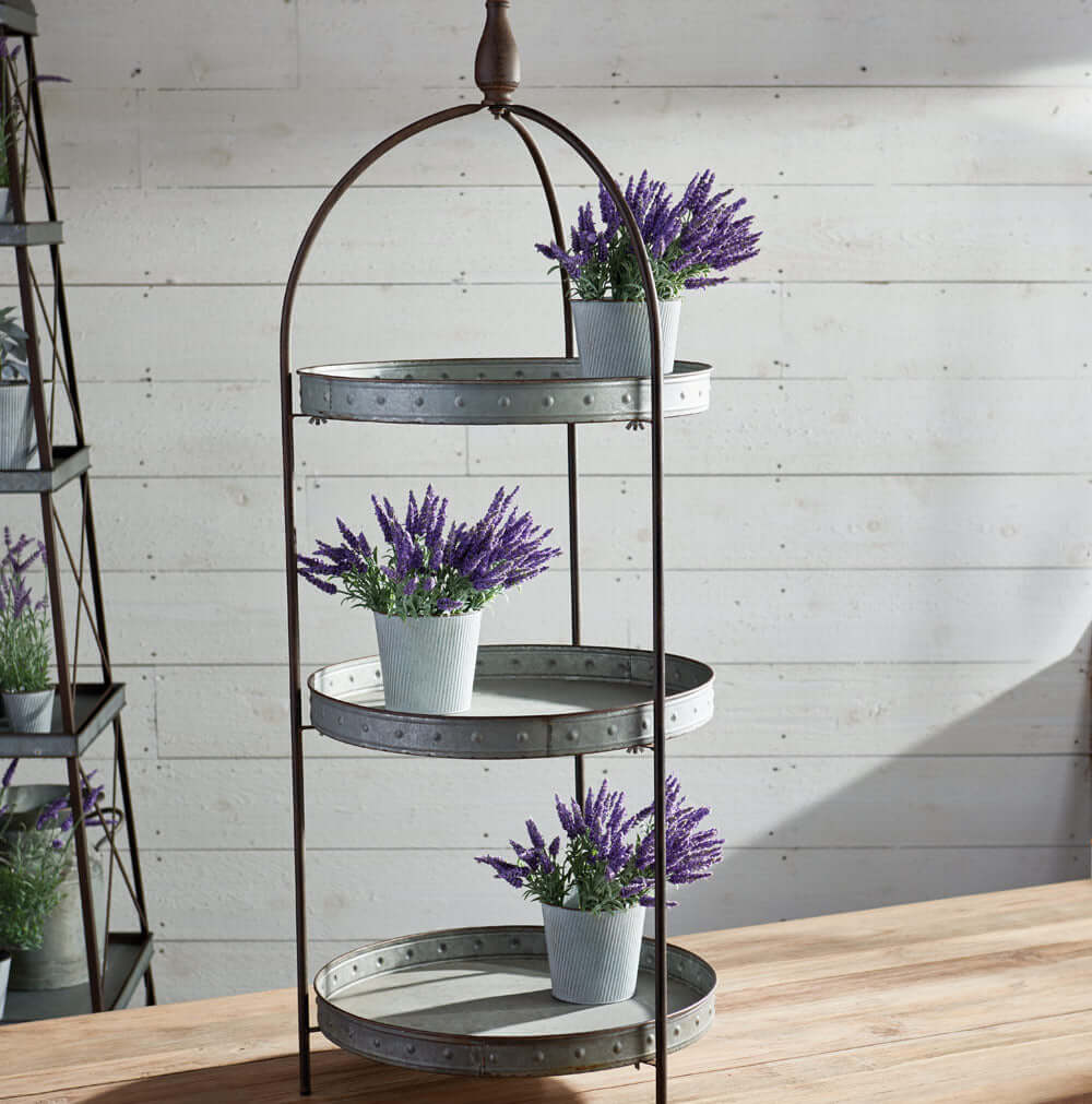 Round Rustic Three-Tier Galvanized Metal Display Stand with plants placed on each tier