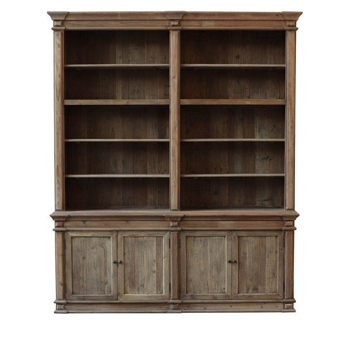Wooden bookshelf with multiple shelves and closed doors on a white background
