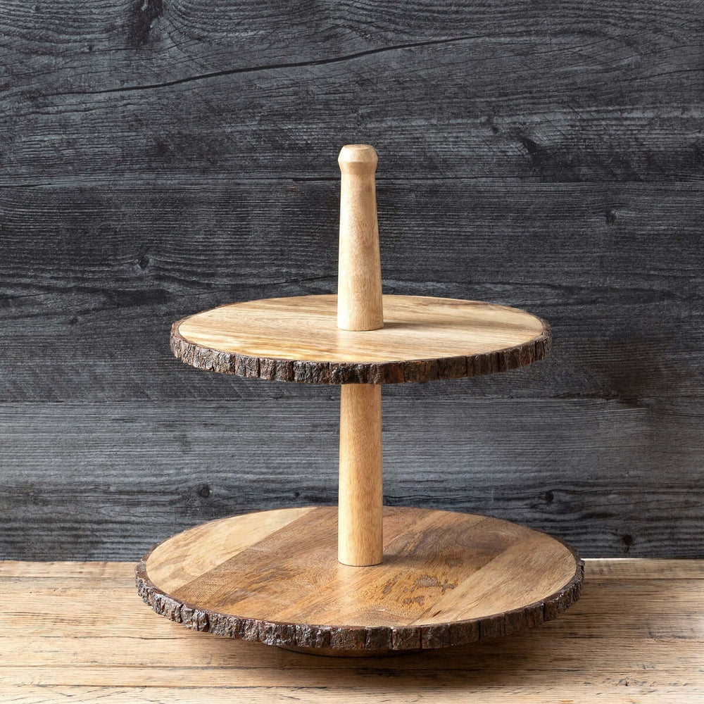 Two-tiered wooden stand with a rustic design against a dark wooden background