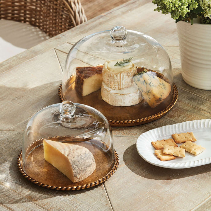 Small Vintage Glass Cloche with Gold Braided Tray next to its larger version and other decor