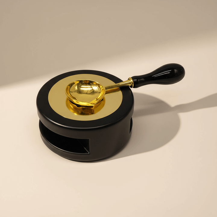 Sealing wax warmer and spoon