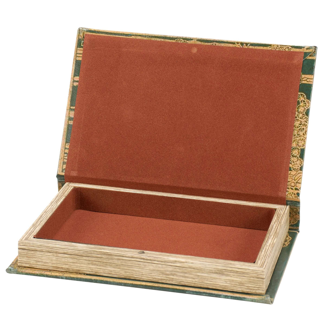 Decorative box with red interior and gold trim on a white background