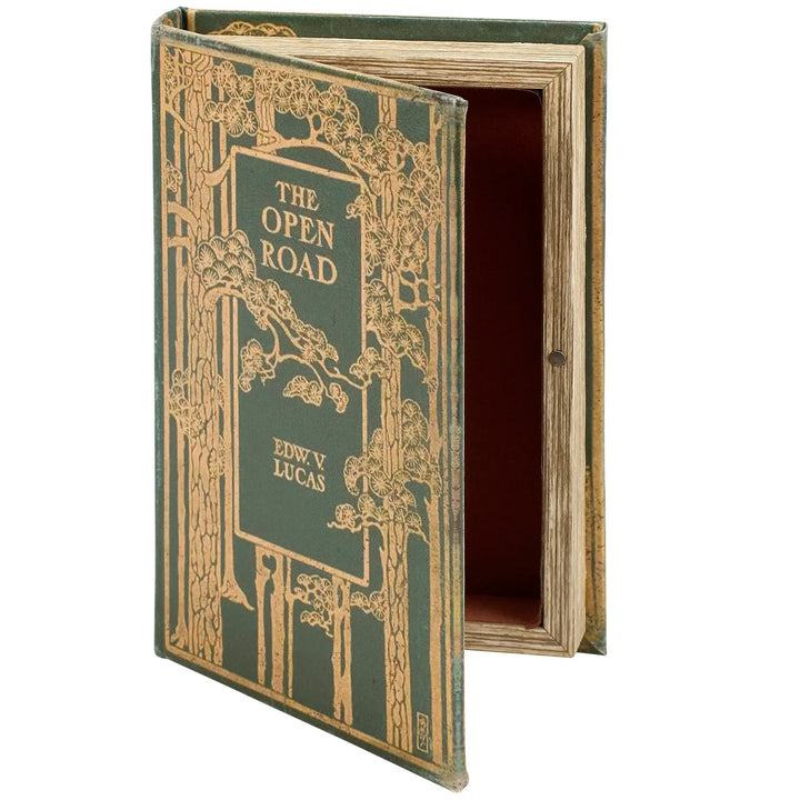 Decorative book with ornate cover and title 'The Open Road' on a white background