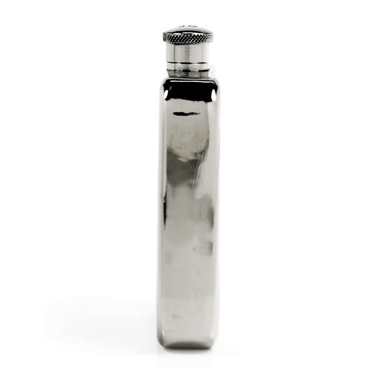Pewter flask with a cap on a white background