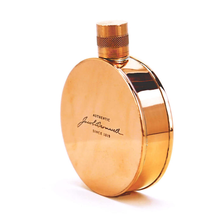 Round copper flask with 'Jacob Bromwell' branding on a white background