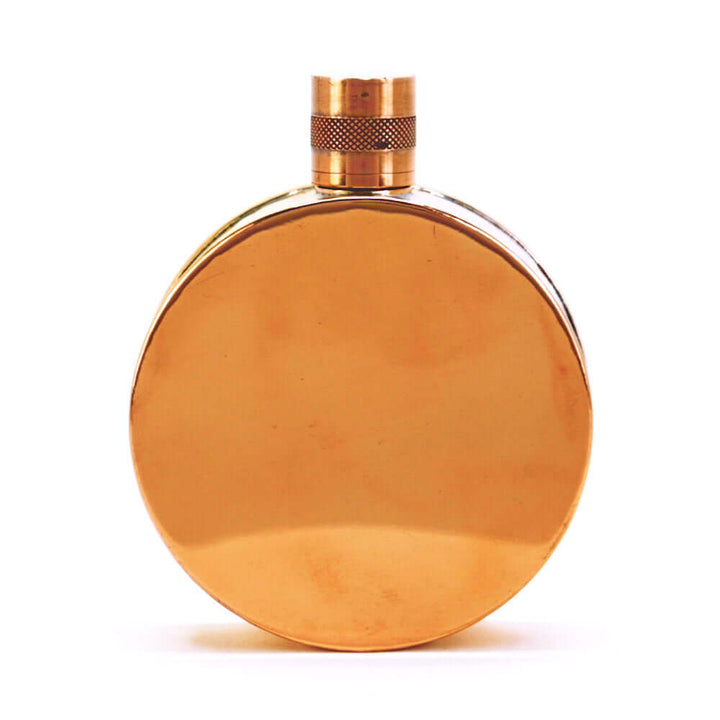 Round copper flask h on a white background