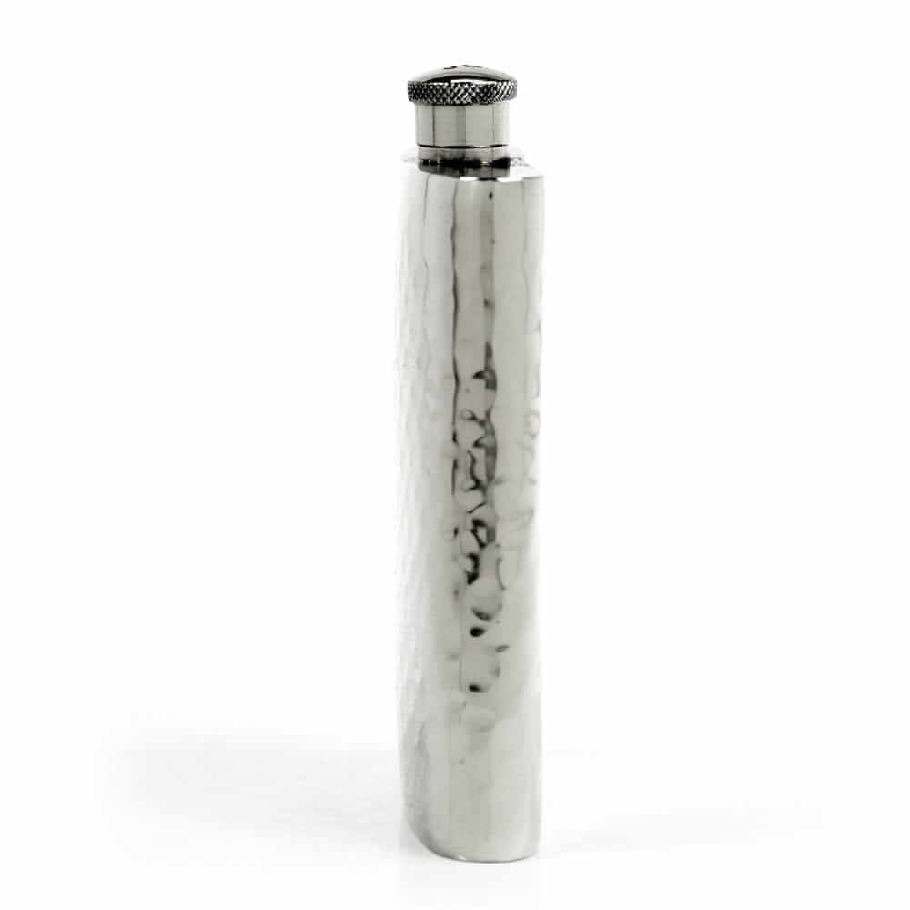 Pewter hammered flask on a white background