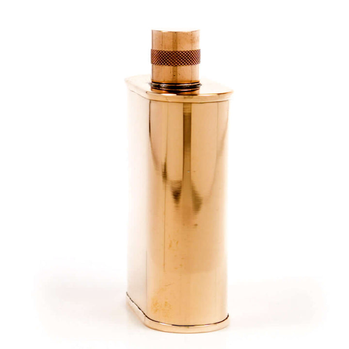 Copper flask on a white background