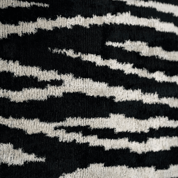 Close-up of black and white striped fabric texture