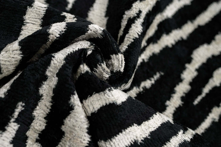 Close-up of black and white striped fabric