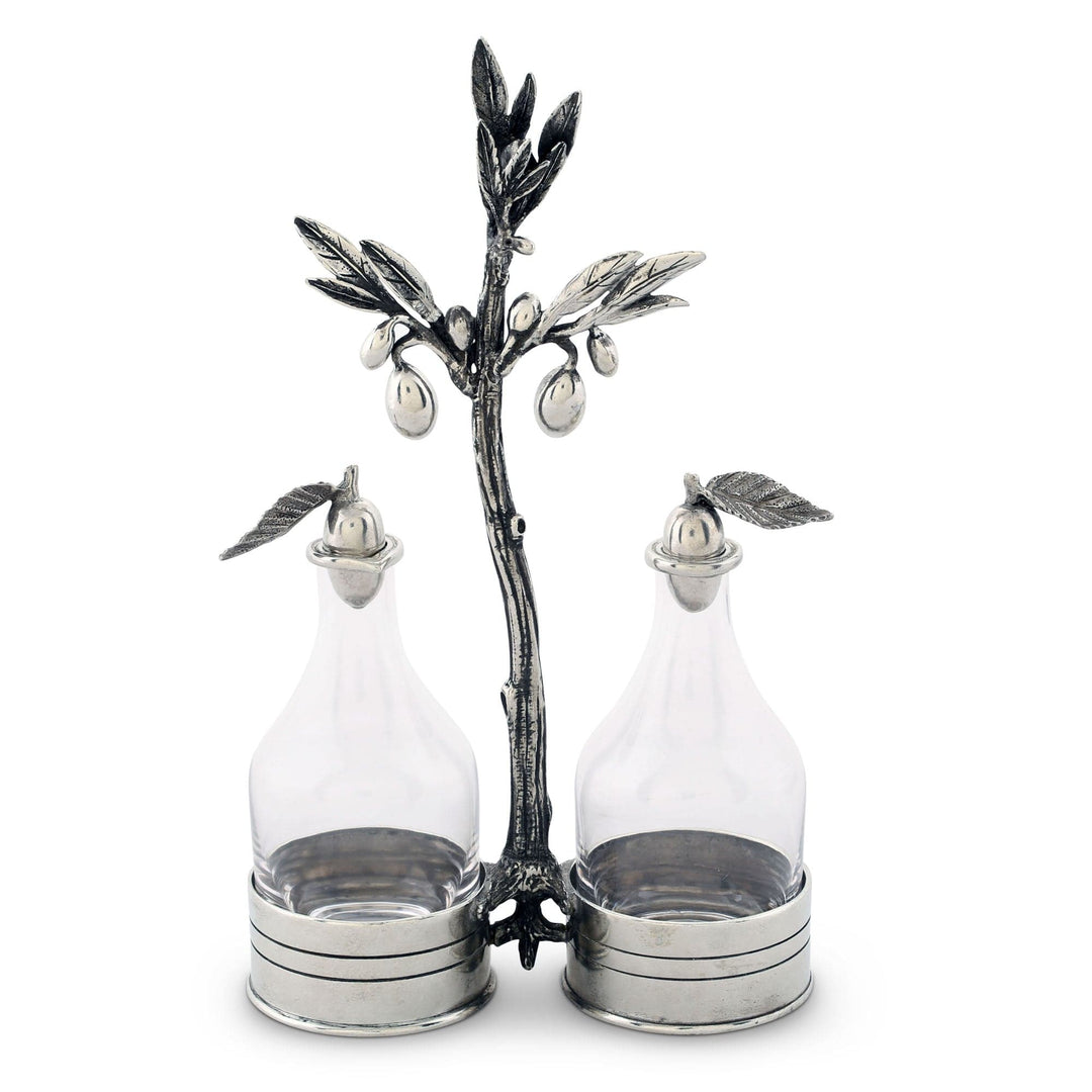 Decorative metal oil and vinegar set with olive tree design on a white background
