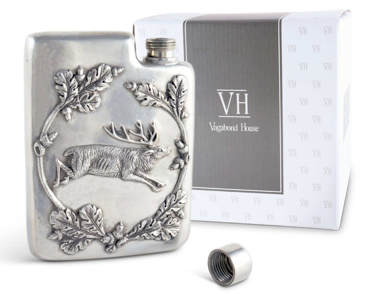 Silver flask with deer design and 'VH' branding on a white background