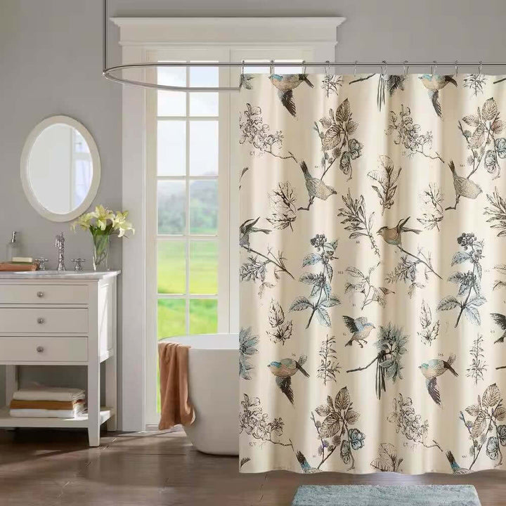 Bathroom with a floral shower curtain, sink, and window.